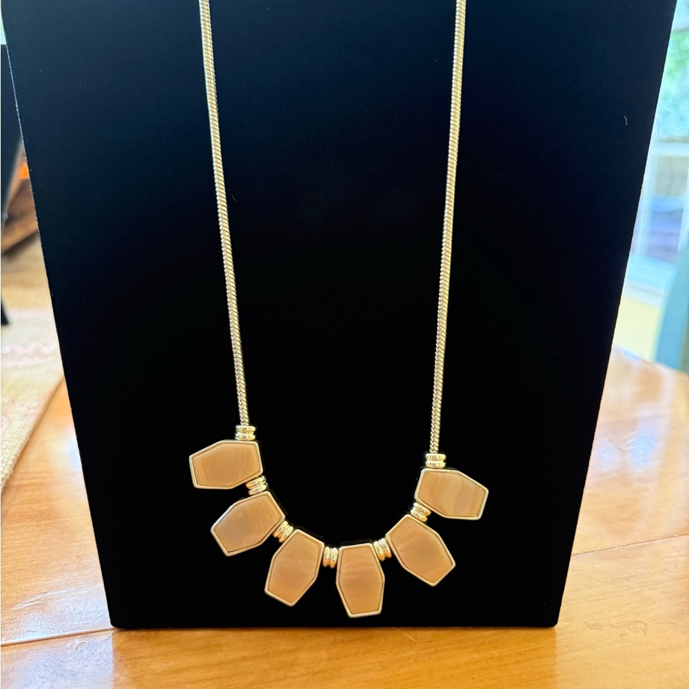Bib Necklace or a Geometric Pendant Necklace.